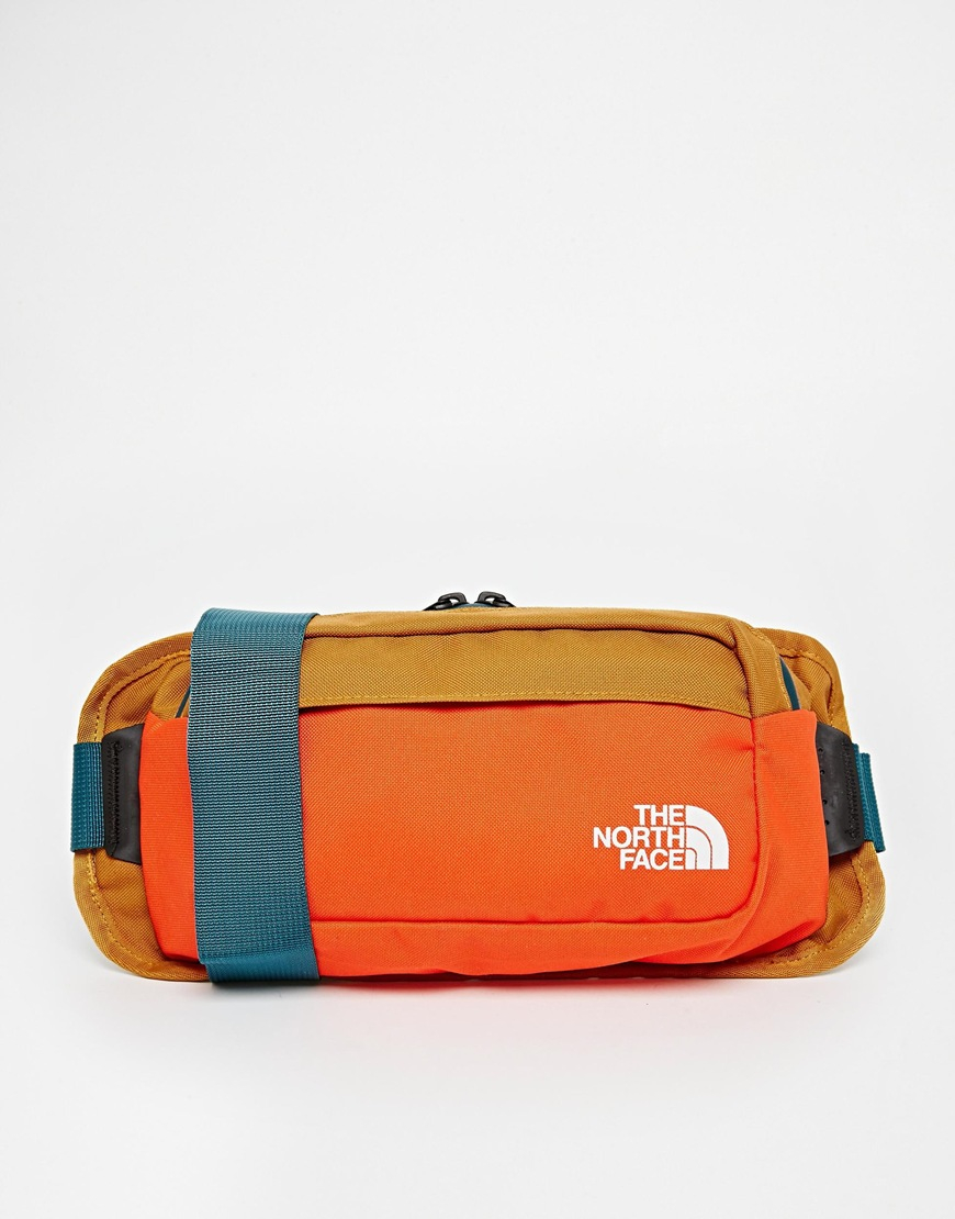 orange north face bum bag