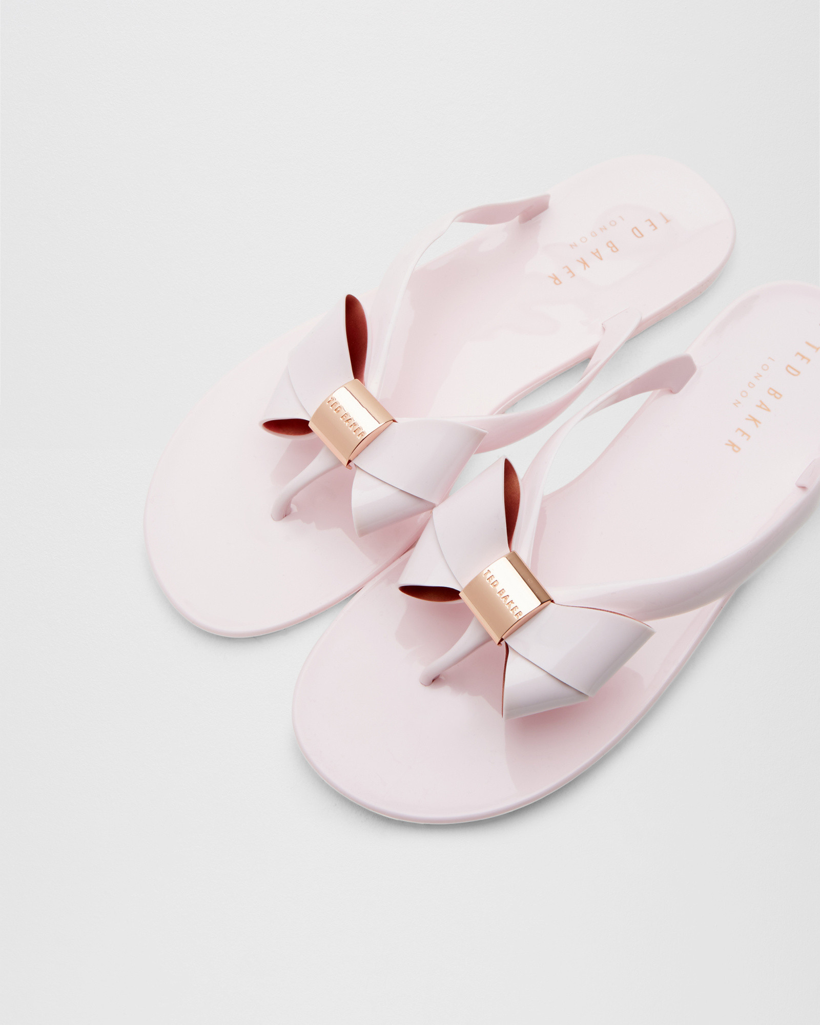 pink bow flip flops