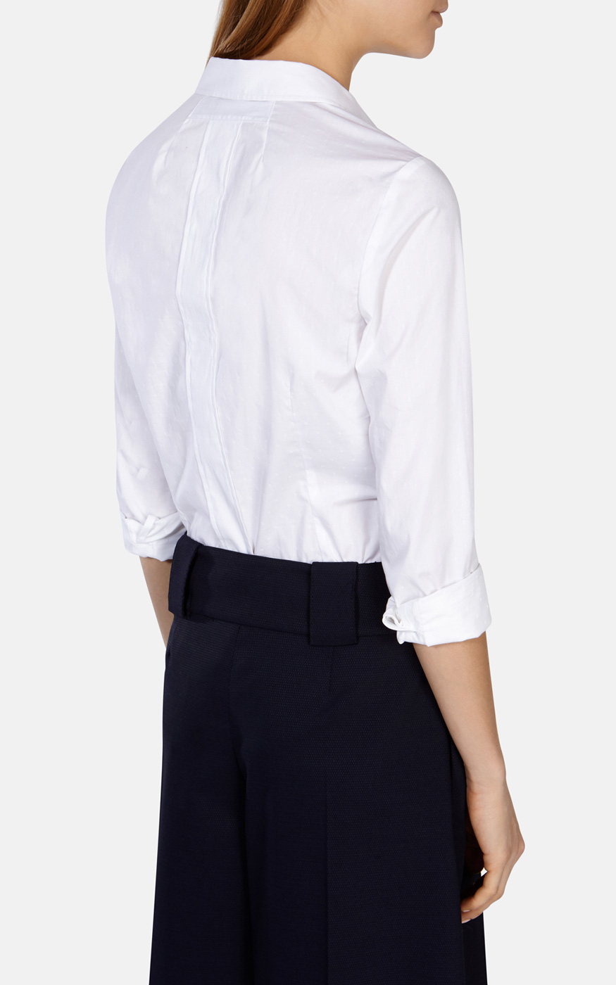 After we find it: The tailored button-up shirt is available in white, blue and striped variations. It's your turn to look great every day with this collection of tops that stand out. There are slim fits which create a streamlined look or classic shapes for a tailored feel.