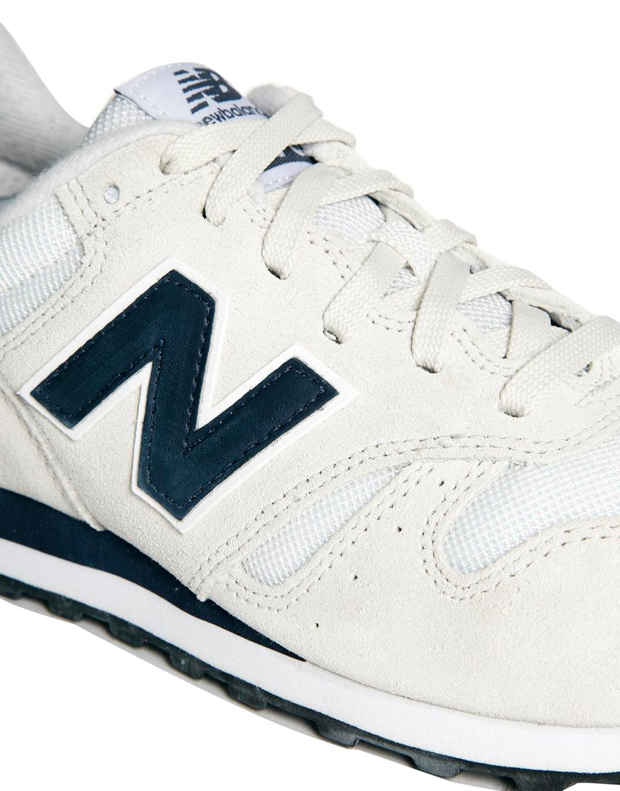 new balance white leather trainers