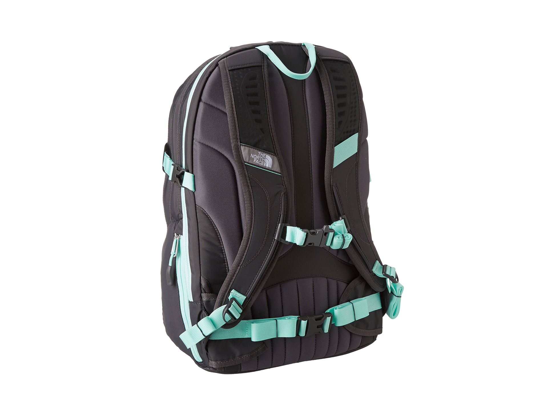 grey and mint green north face backpack