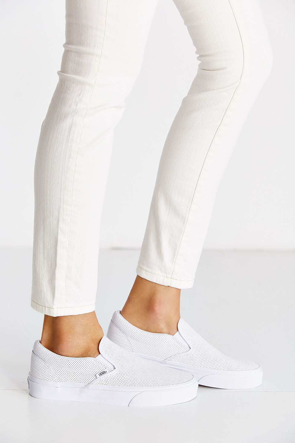 white leather slip on vans womens