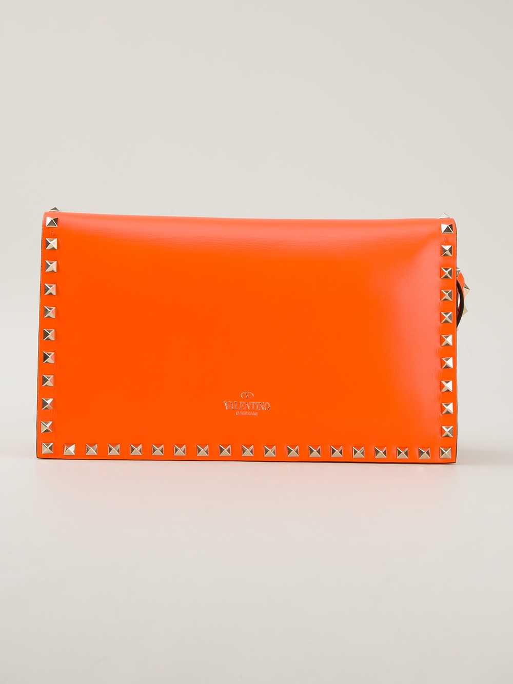 Lyst Valentino Rockstud Clutch Bag in Orange
