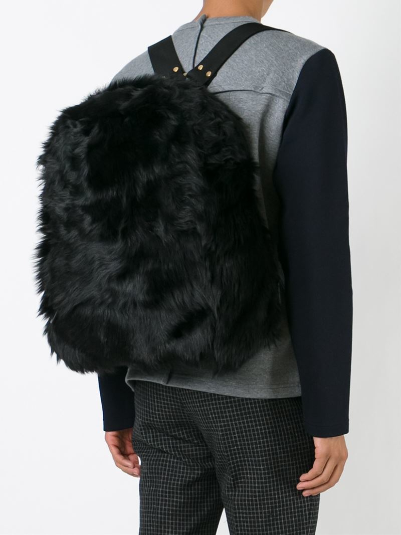 black fluffy backpack