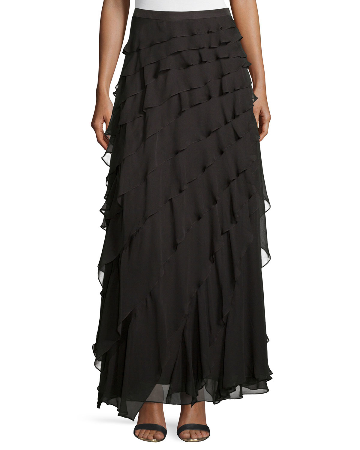 Long ruffled skirt Ruffle Skirt A soft swirl of fabric at the ankles, a flowing blouse, a bold shoe choice—all fun ways to create a flirty wardrobe. A ruffle skirt, paired with a peasant blouse and boots or dressed up with heels is an easy way to get that soft and romantic look.