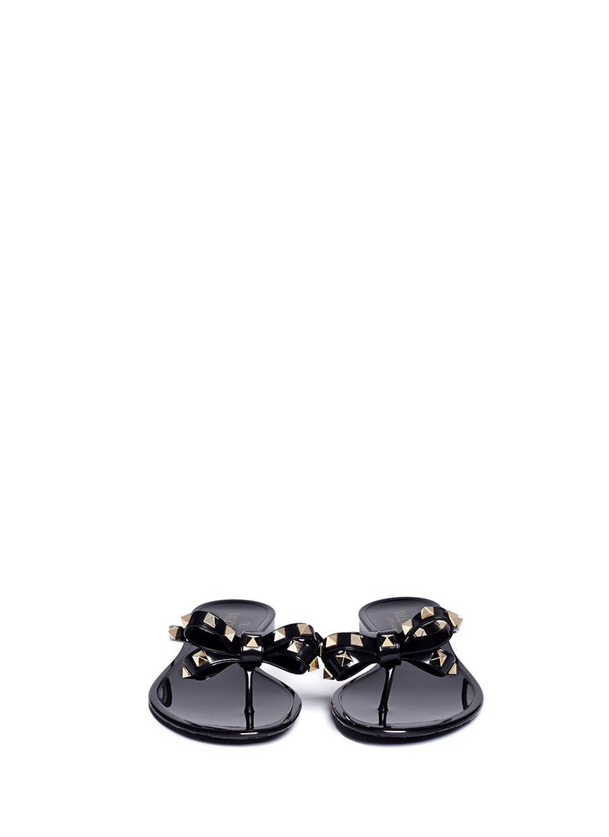 Valentino Rockstud Bow Flat Jelly Sandals in Black - Lyst