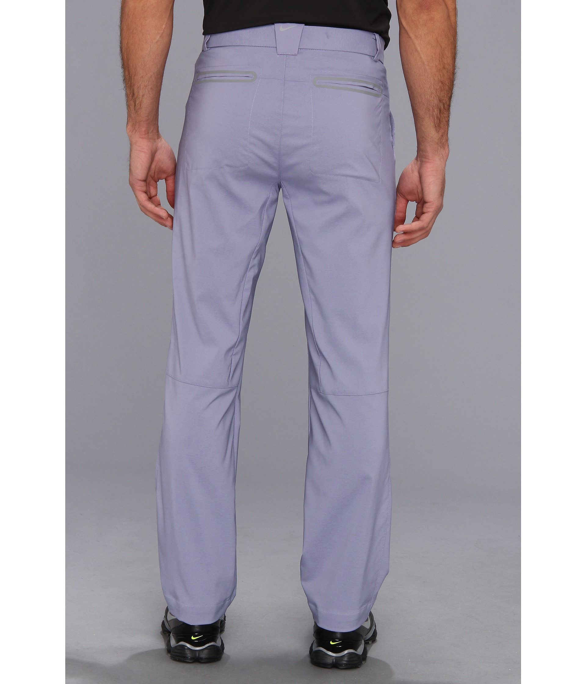 purple nike tech pants