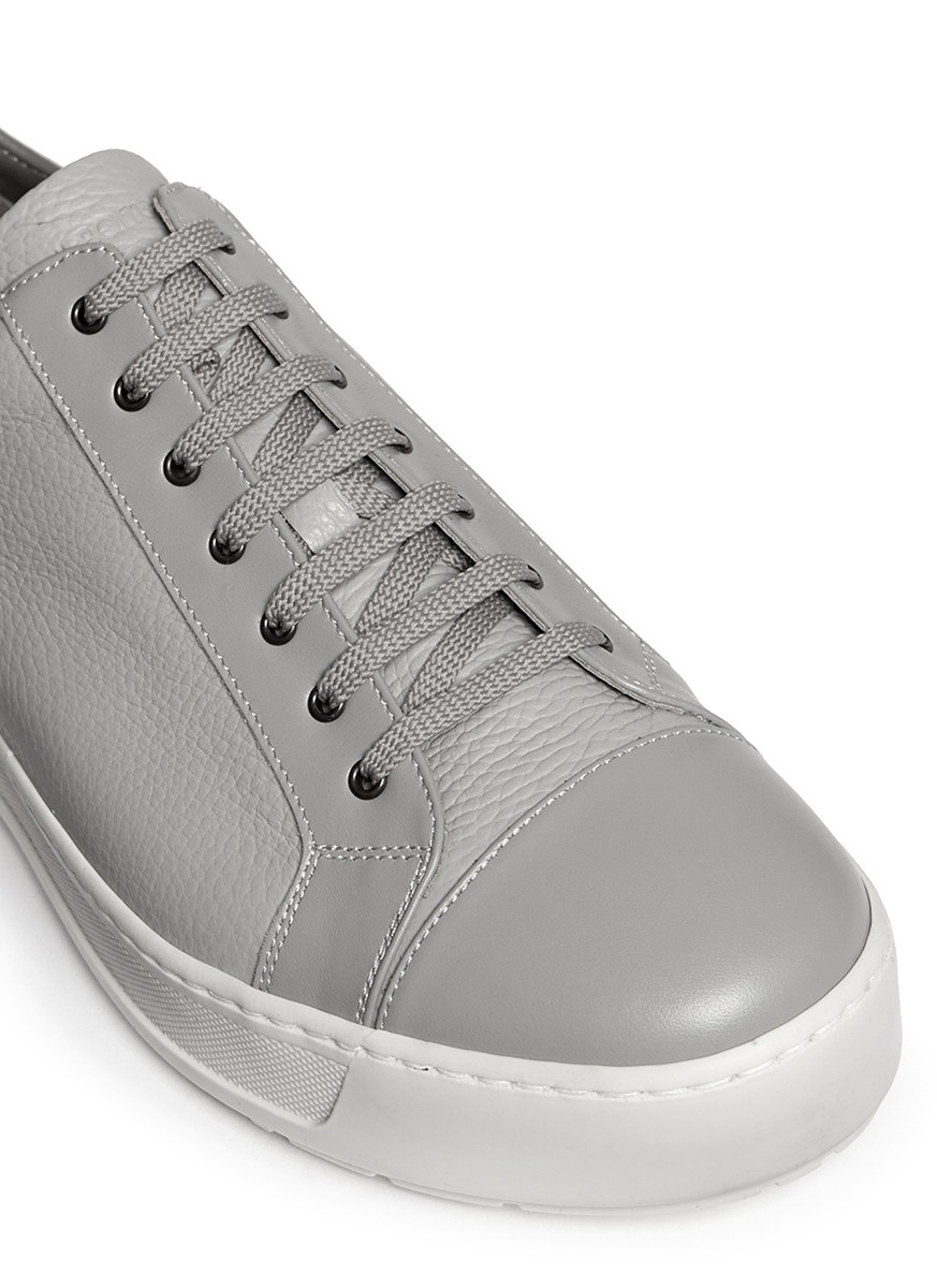 grey leather sneakers