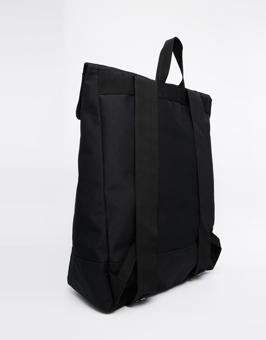 black fold over backpack