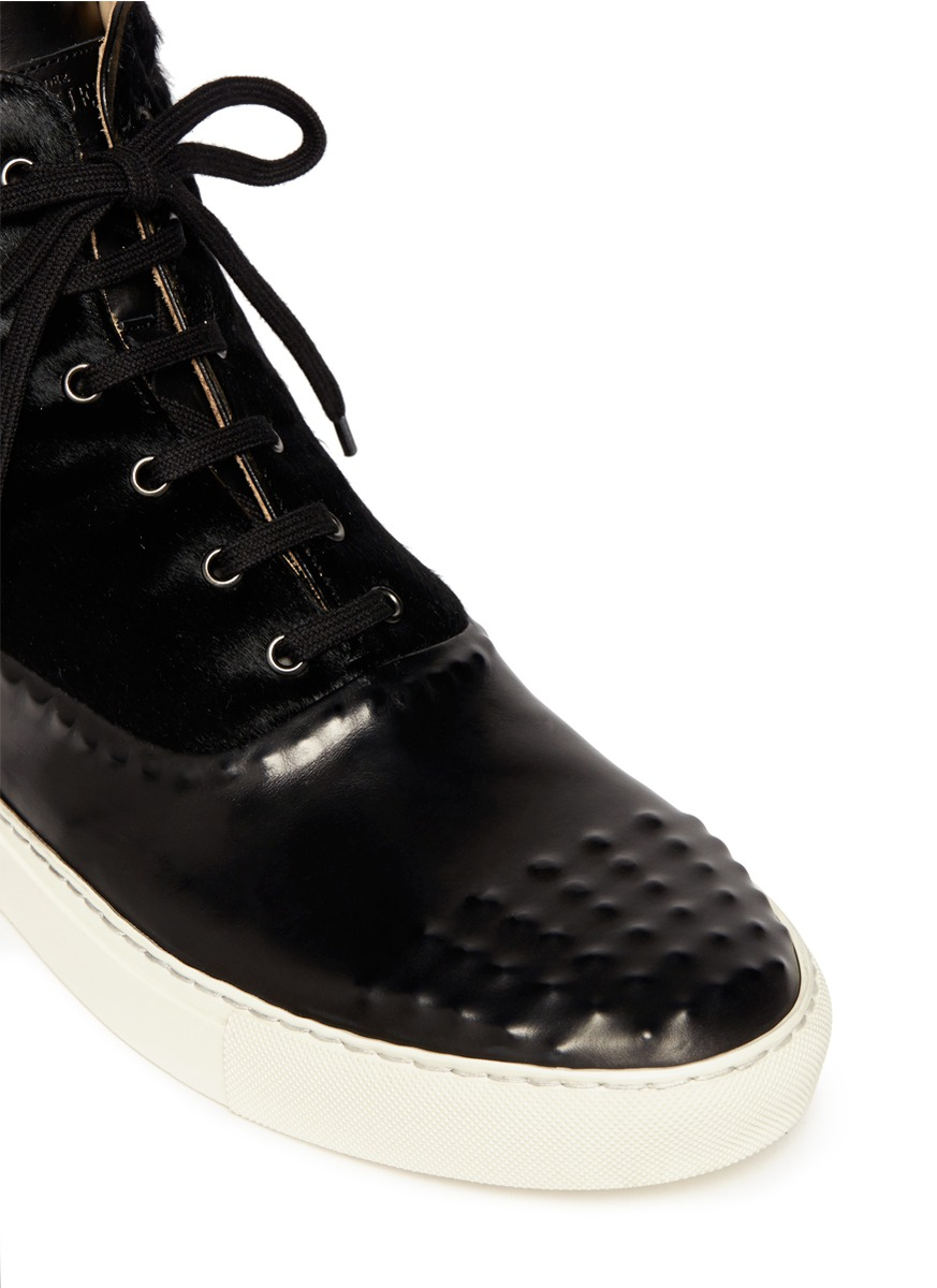 alexander mcqueen studs sneakers