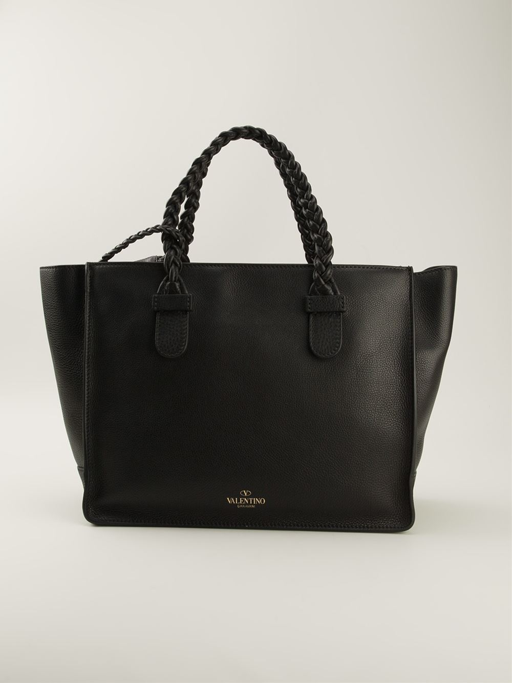 braided handle handbag