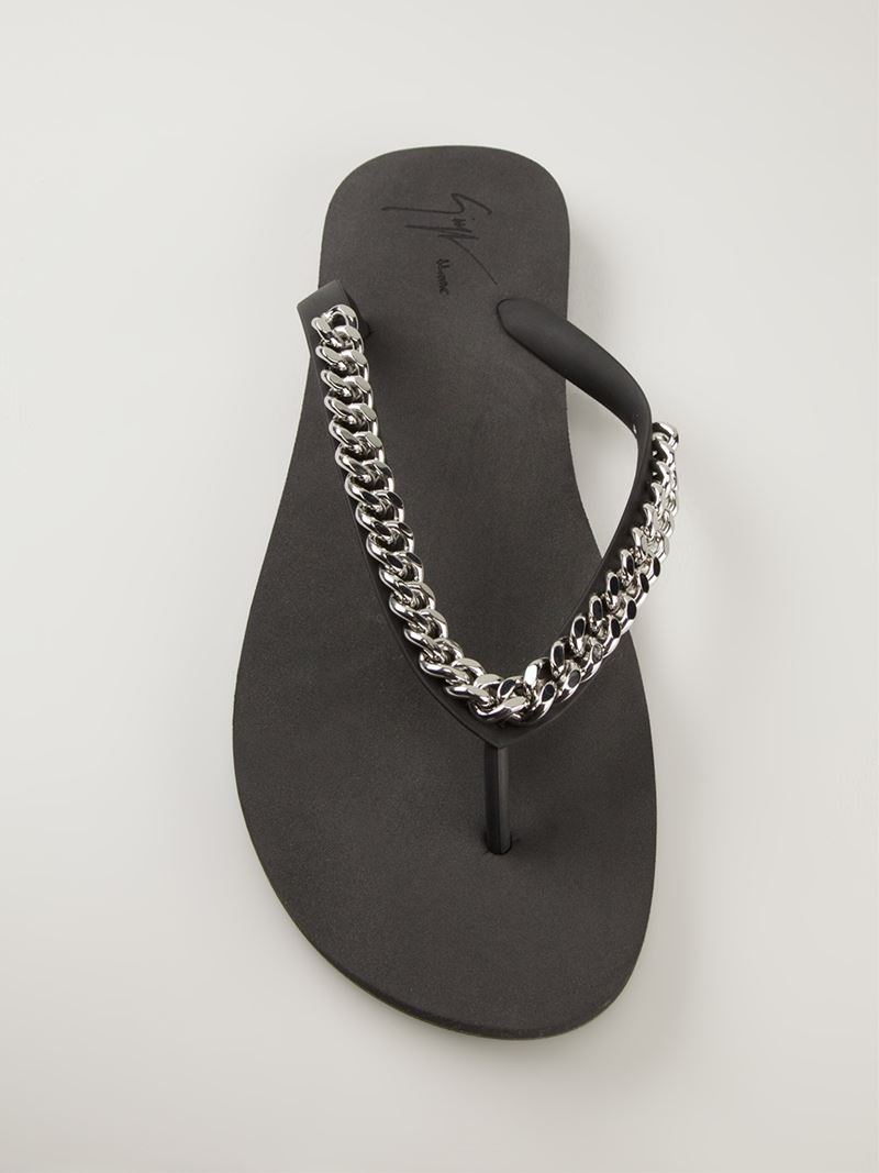 black and silver flip flops