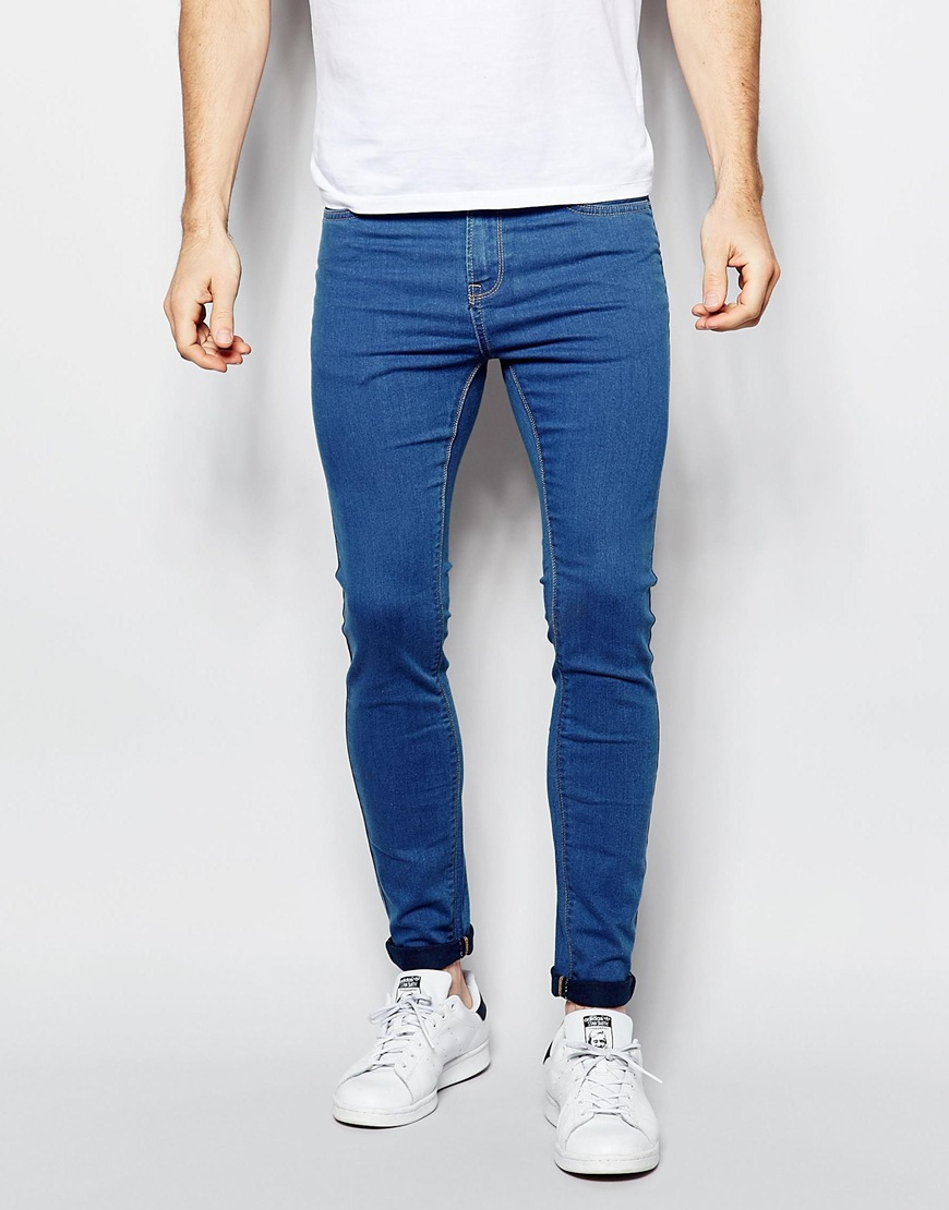 washed blue skinny jeans