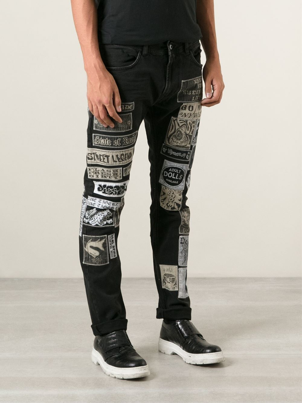 black jeans with patches