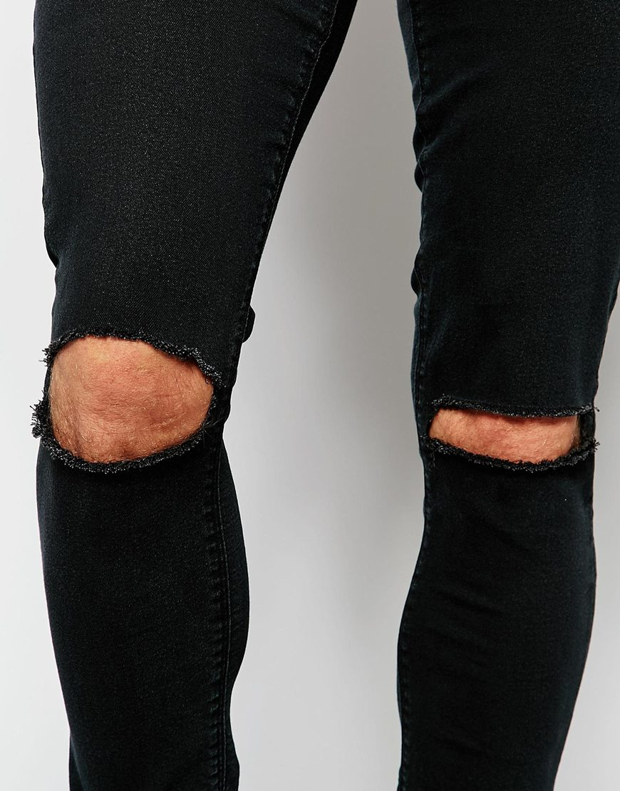 black skinny jeans with knee rips
