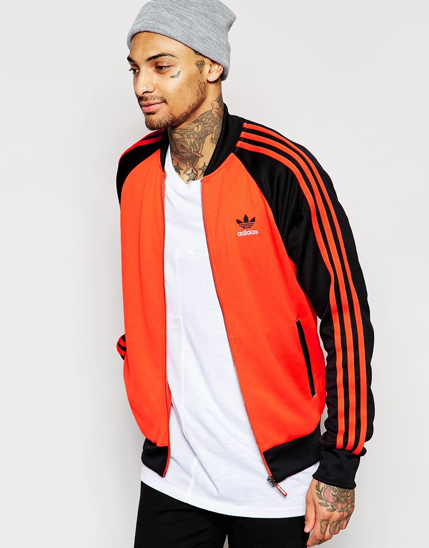 adidas orange and black jacket