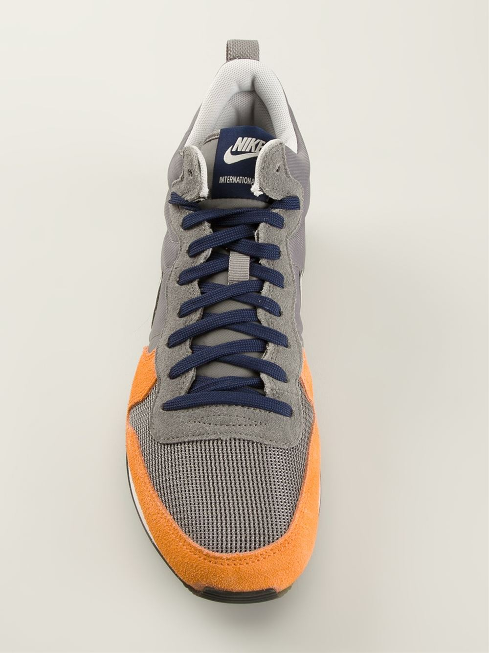 nike internationalist grey orange