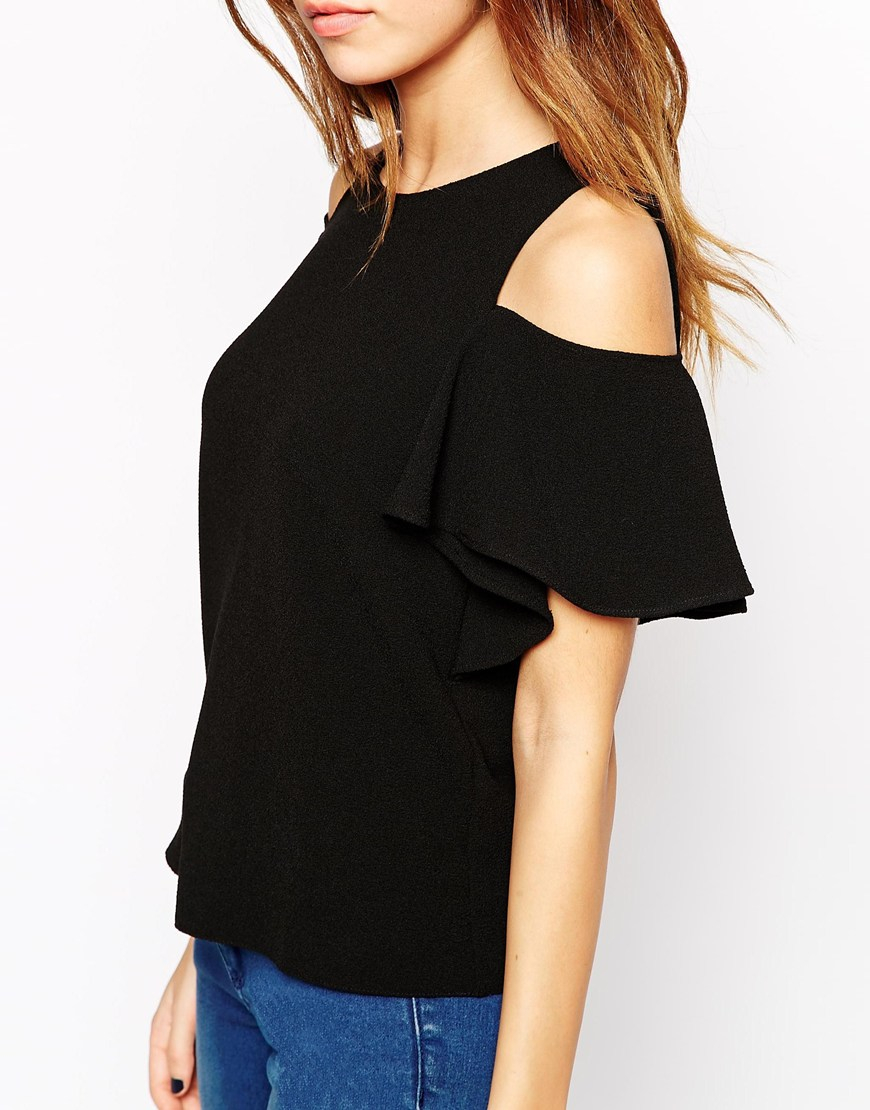 black ruffle shoulder top