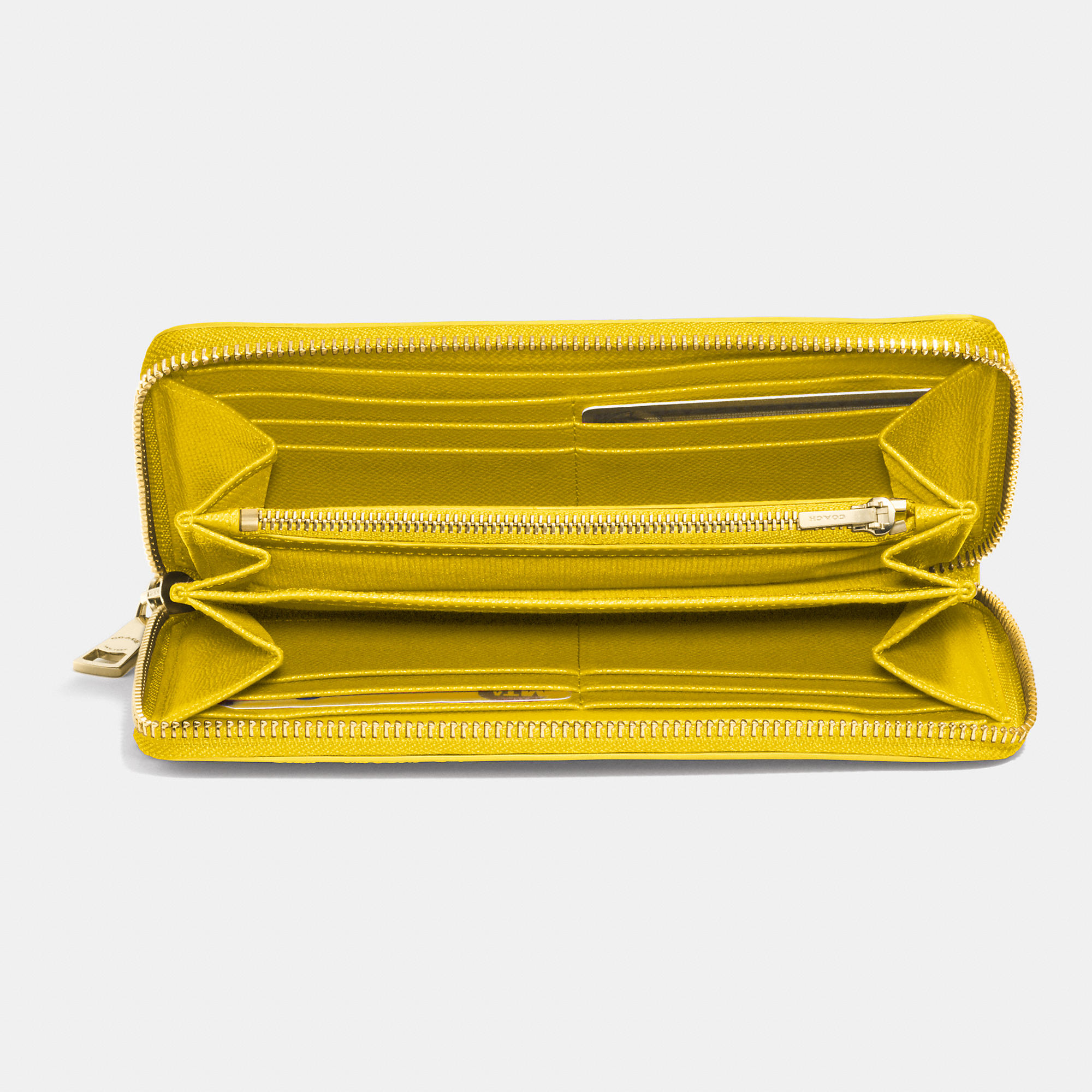 COACH Accordion Zip Wallet In Crossgrain Leather in Yellow