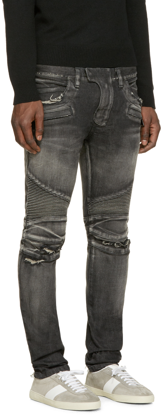 black ripped balmain jeans