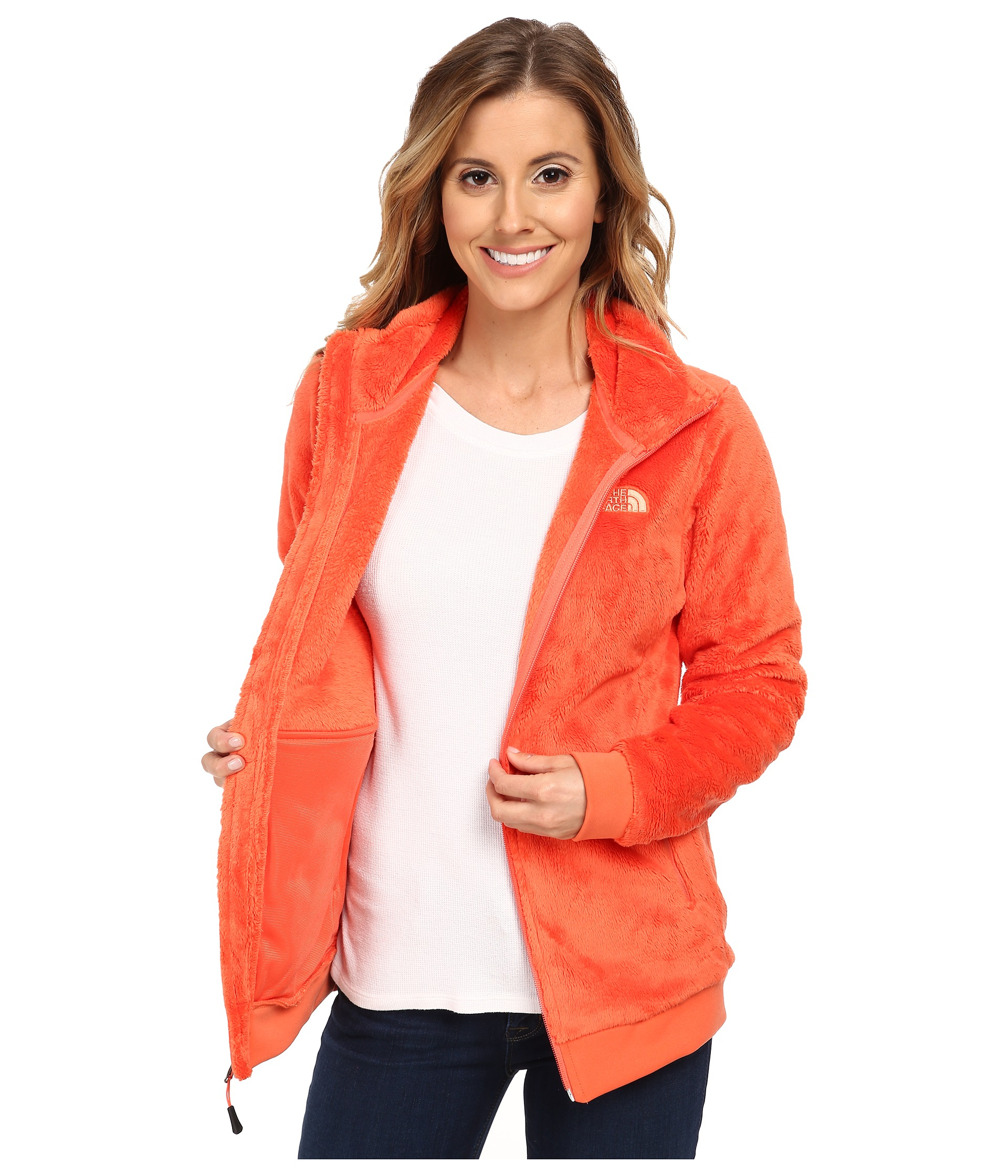 red fuzzy north face jacket