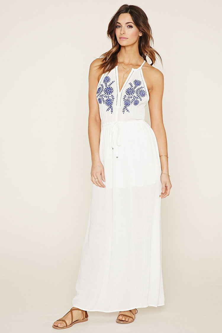 white maxi dress with blue embroidery