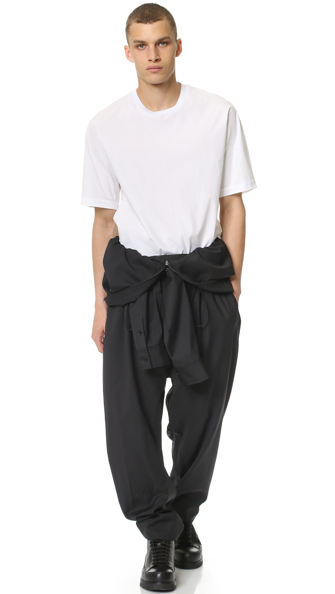 boiler suit tied around waist