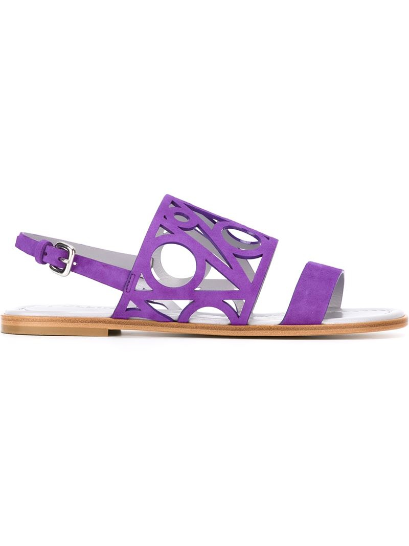pollini laser cut flat sandals in pink lyst pollini laser cut flat sandals in pink lyst