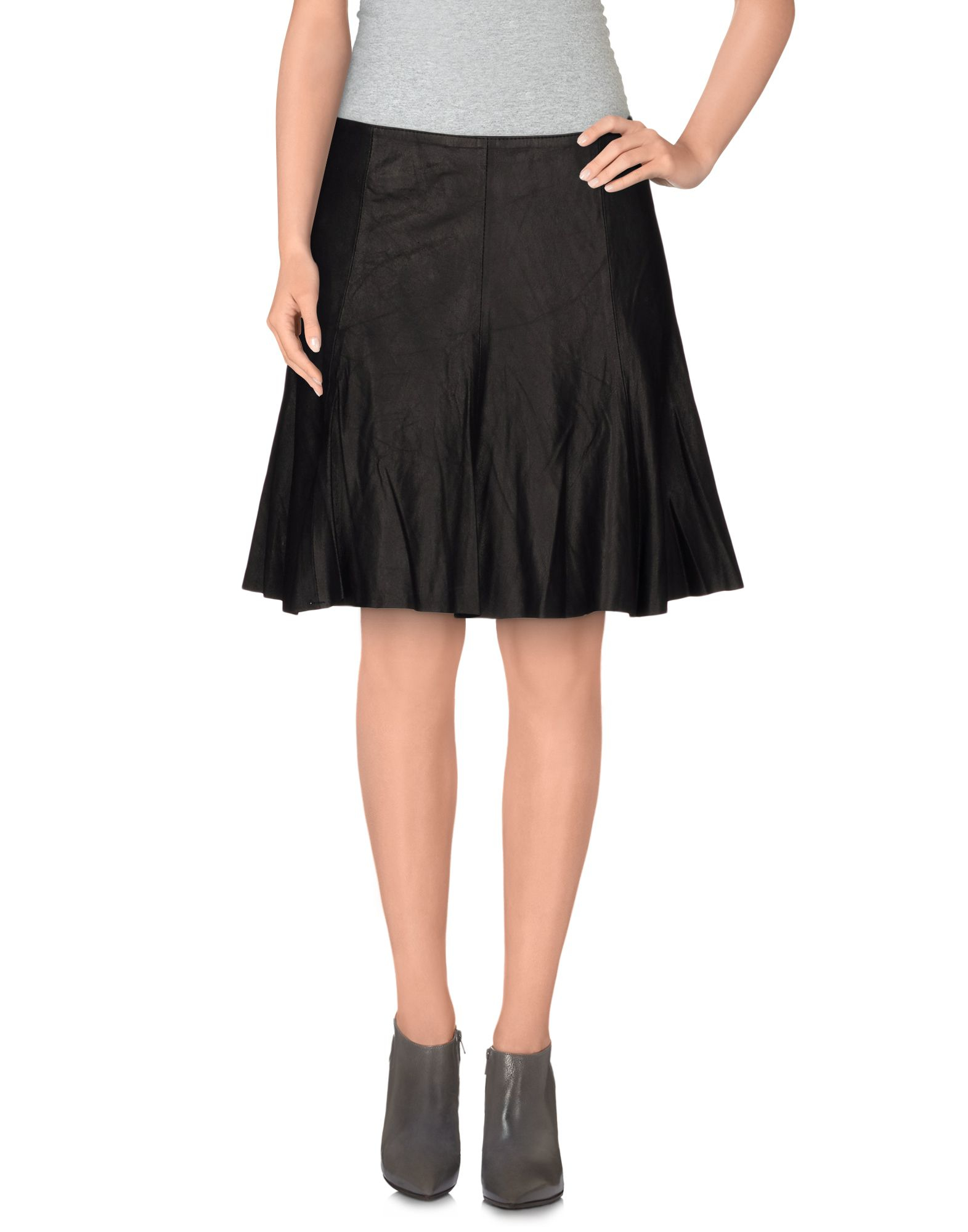 Black knee length skirts The ultimate in versatile pieces, 'Sorcha' is your go-to skirt. In gorgeous black bandage fabric with a figure flattering fit and knee length cut. Tuck in a favourite shirt to emphasise the flattering high waist cut or team with a cropped top.