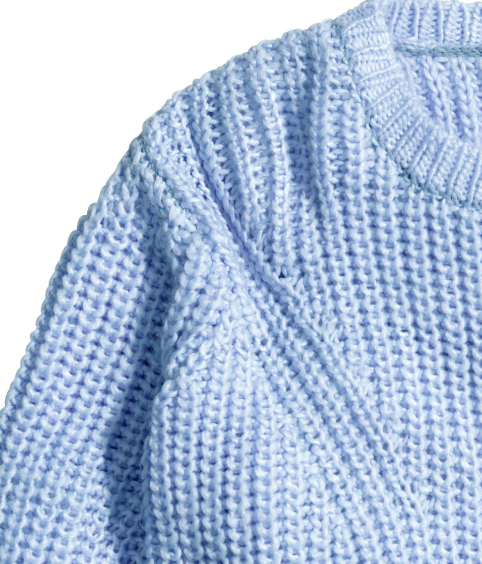 blue knitted jumper