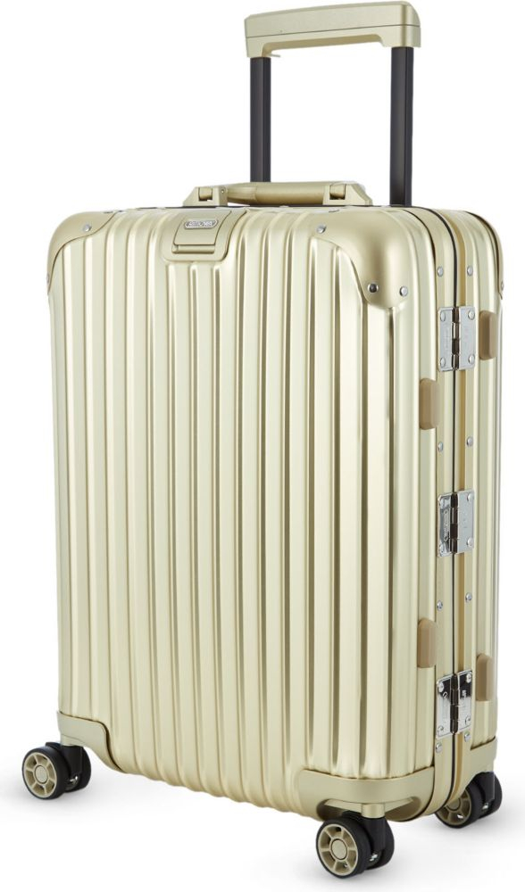 Rimowa Topas Four-wheel Titanium Suitcase 50cm, Gold in Gold | Lyst