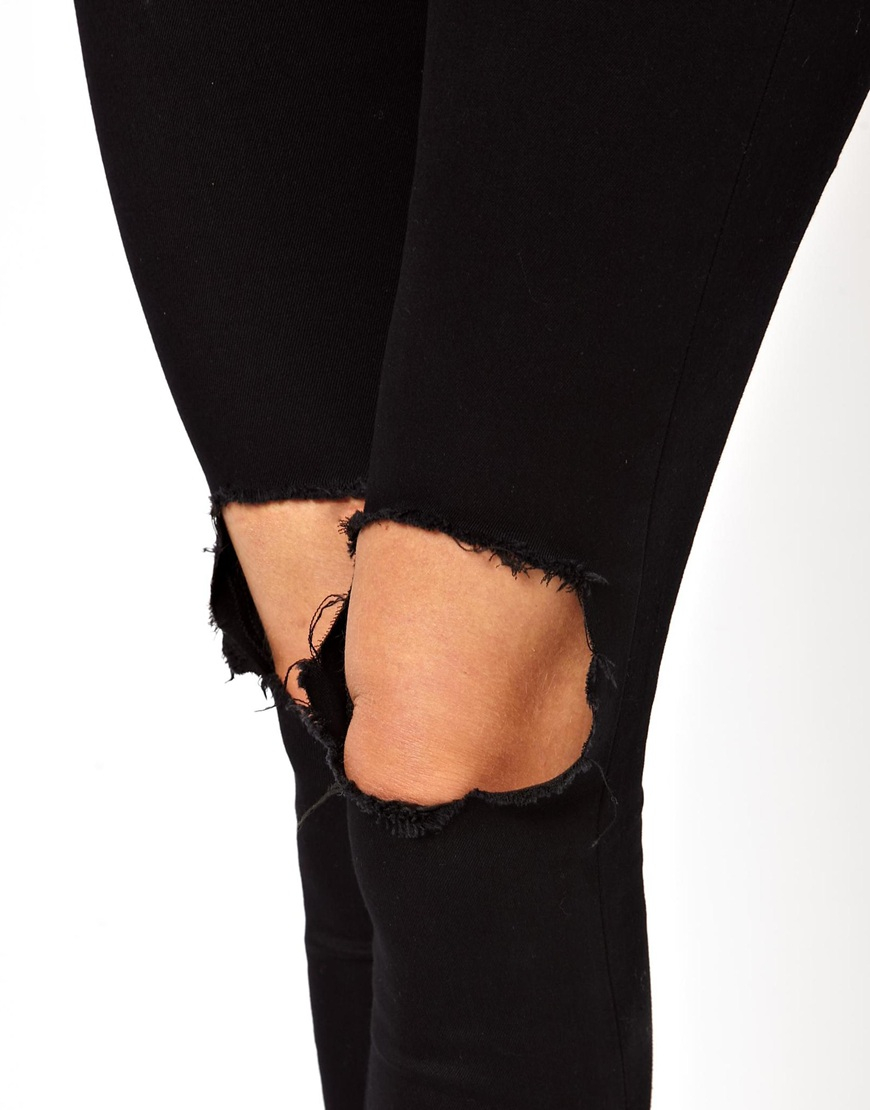 busted knee black jeans