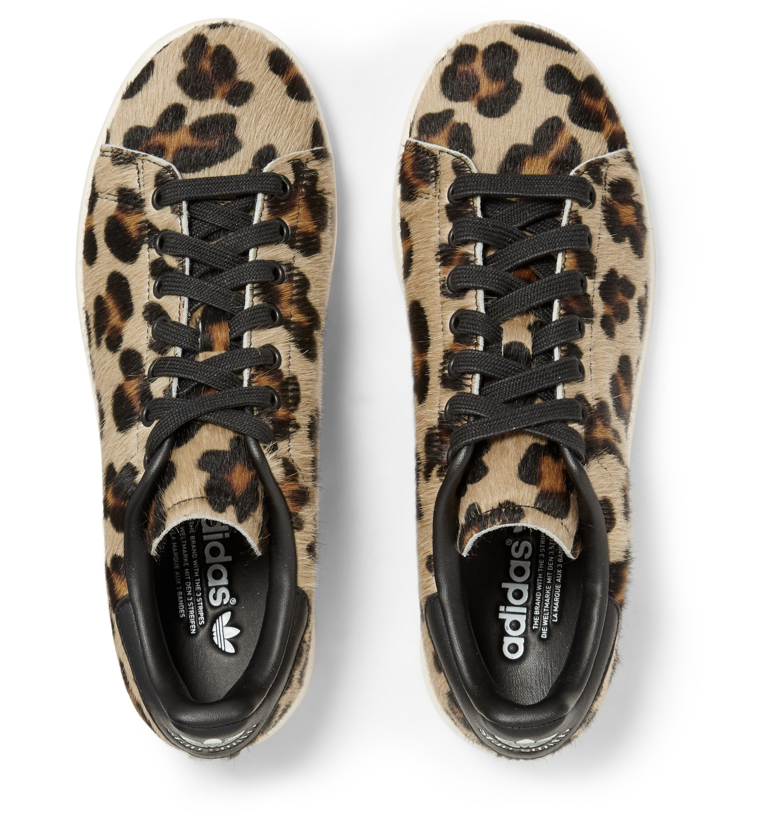 slide sneakers with leopard print pony skin inserts