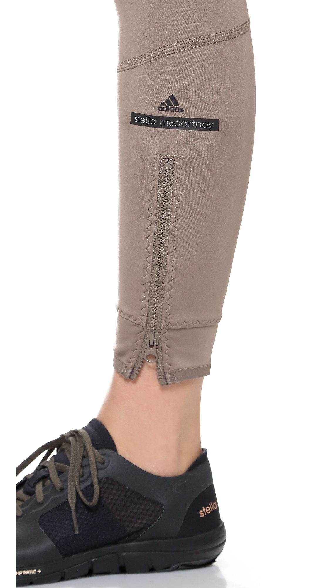 https://cdna.lystit.com/photos/5573-2015/07/02/adidas-by-stella-mccartney-cement-grey-78-leggings-cement-grey-gray-product-0-063872205-normal.jpeg