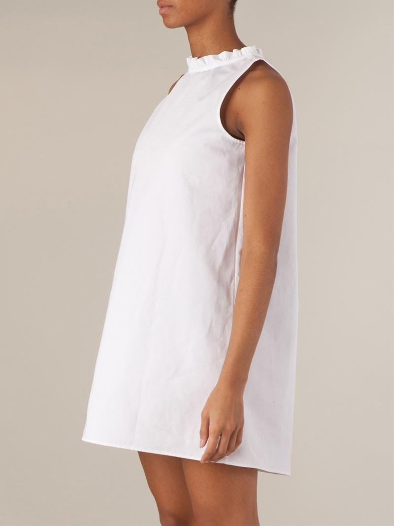 white ruffle neck dress