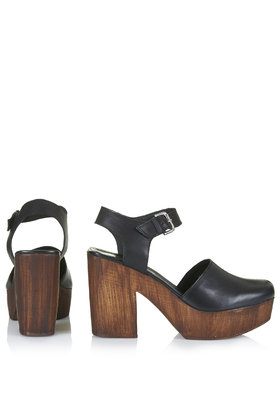 black wooden clogs