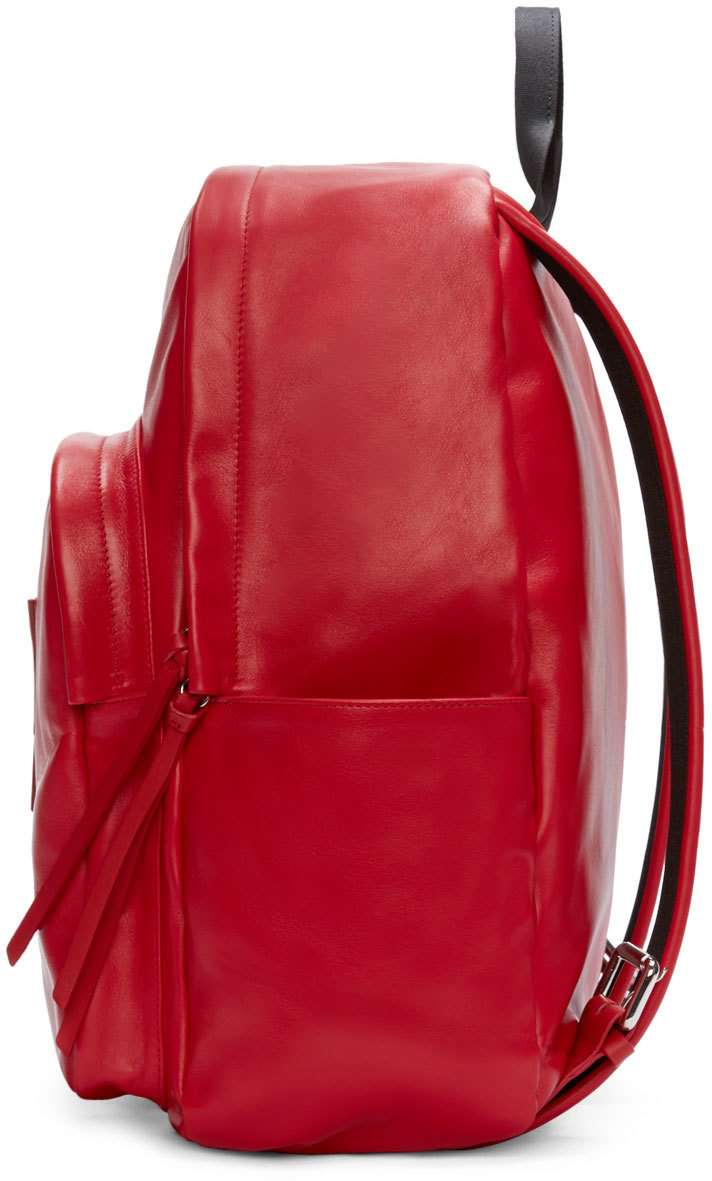 red leather back pack
