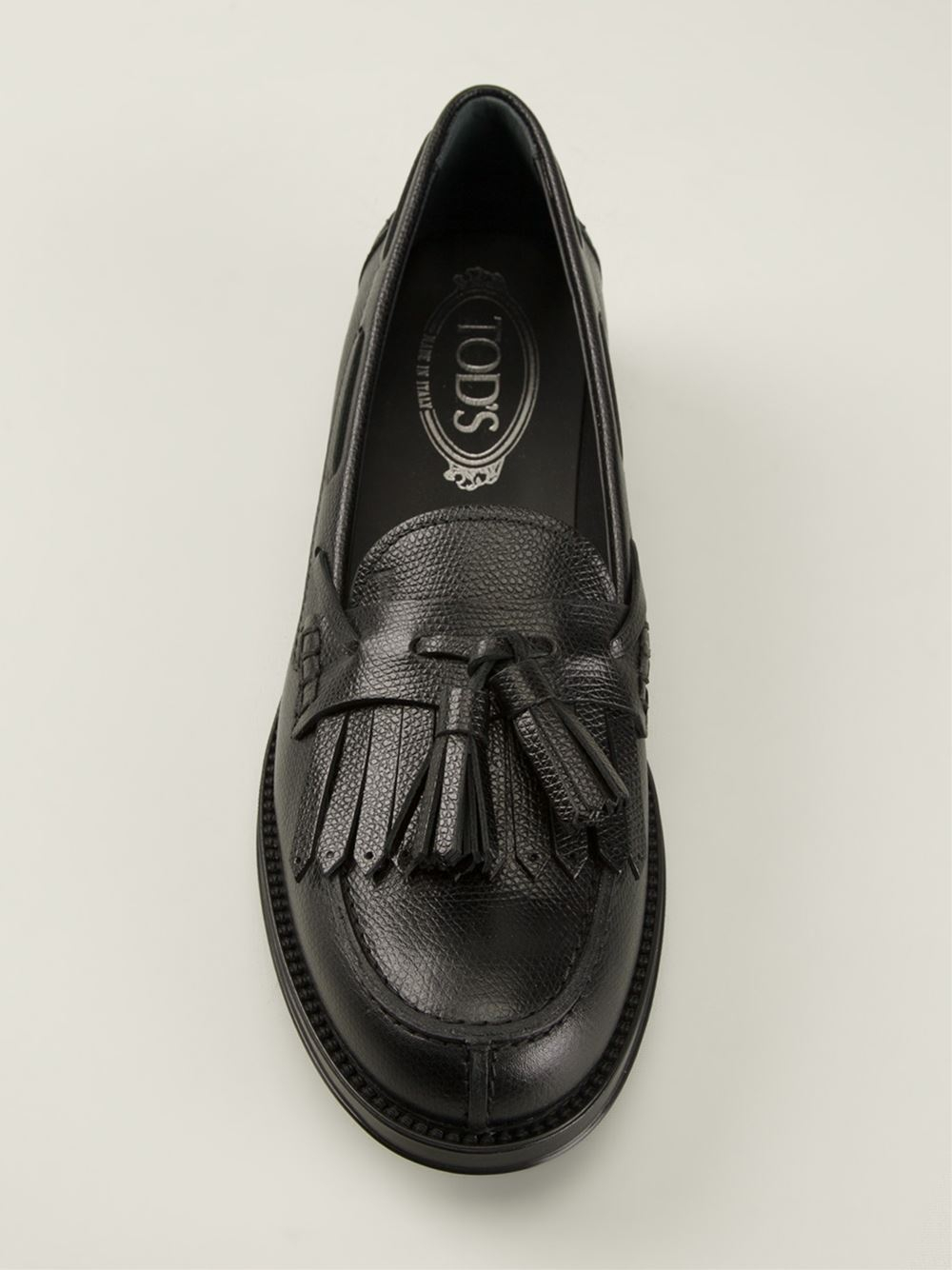 Tod's Pebbled Fringe And Tassel Loafers in Black | Lyst