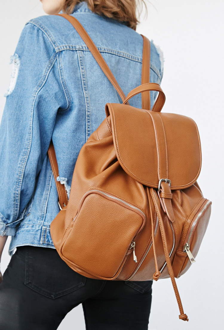brown leather drawstring backpack