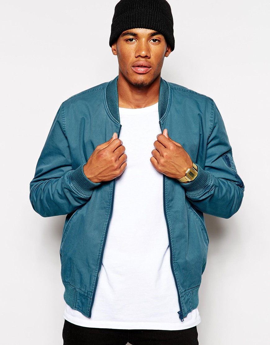 teal bomber jacket
