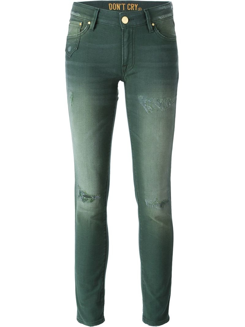 green faded jeans