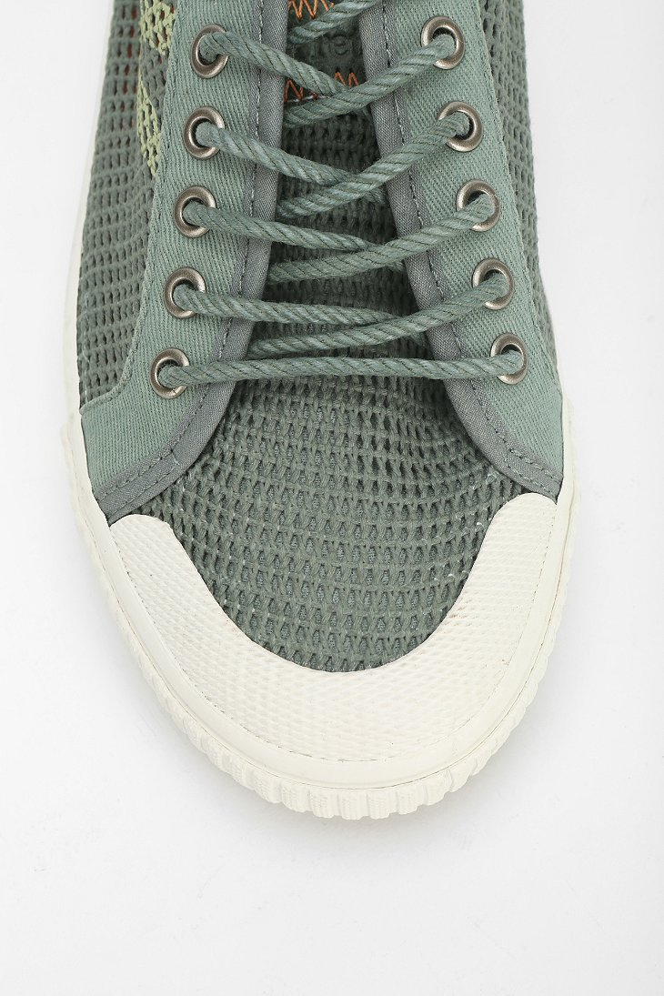 green and white tretorn