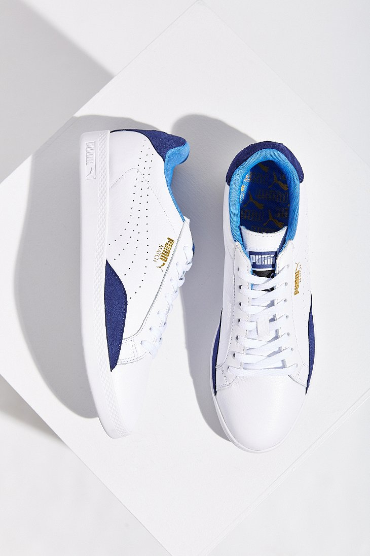 navy blue high top pumas