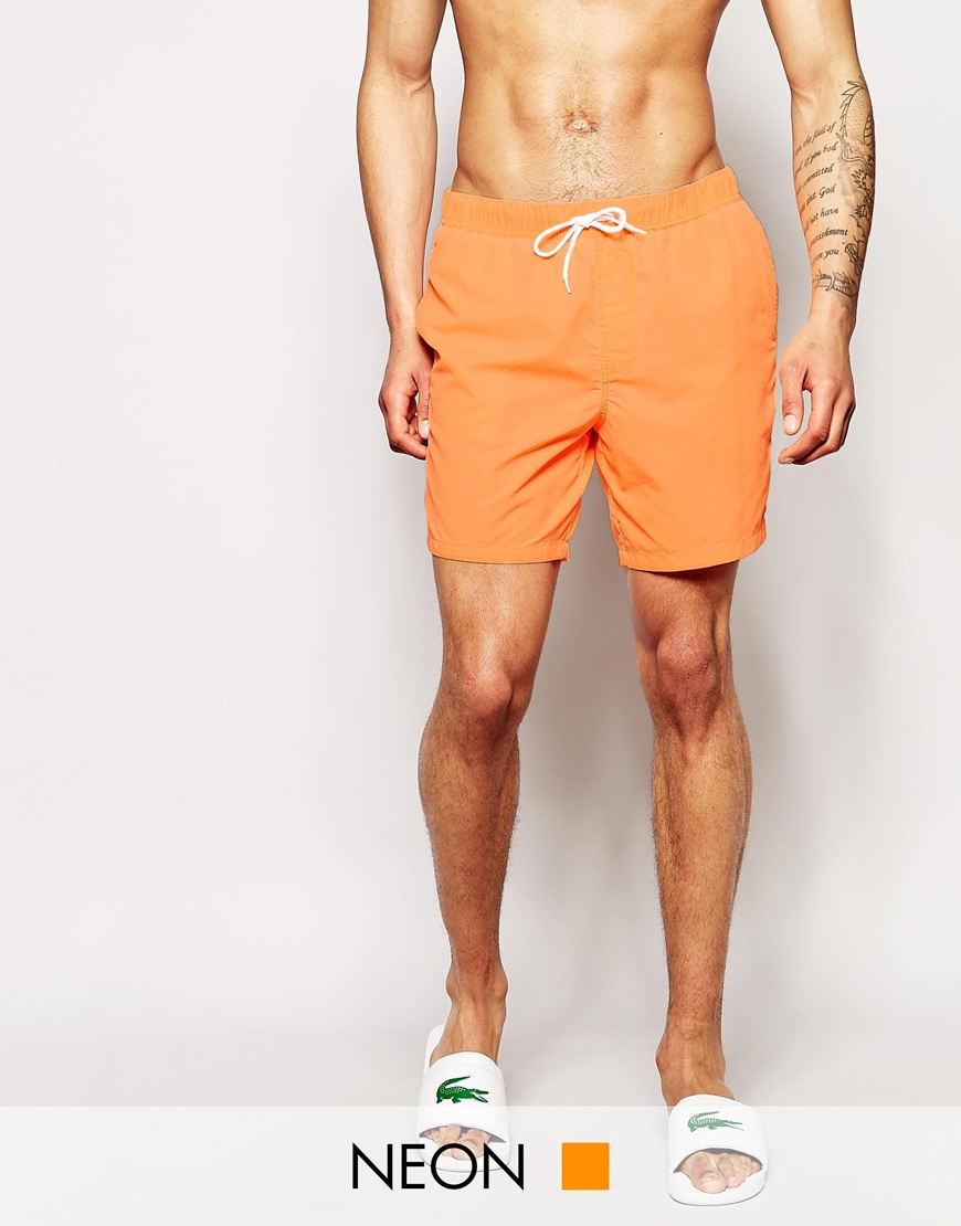 neon orange swim shorts