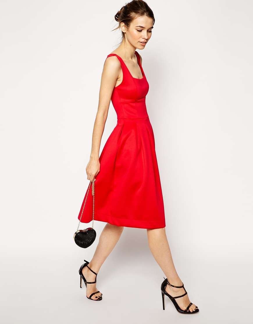 red sleeveless midi dress