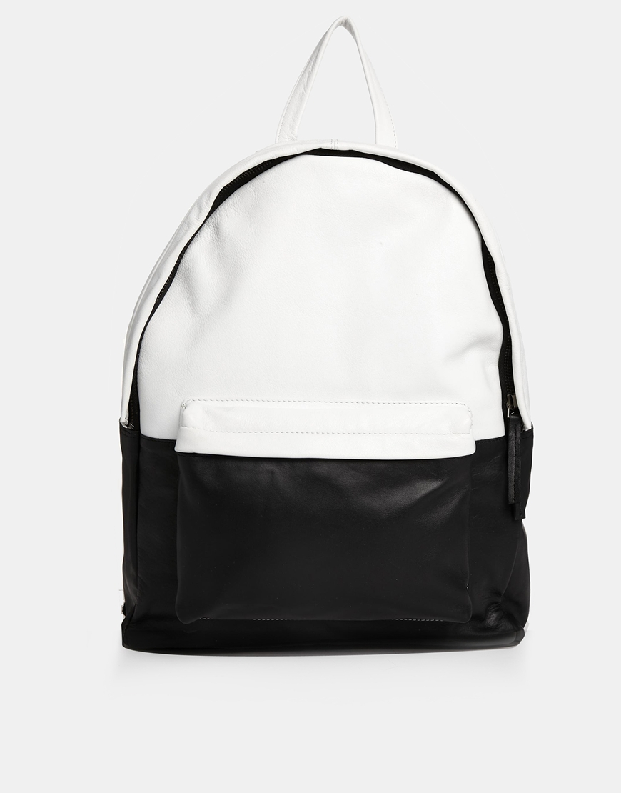 black and white leather backpack
