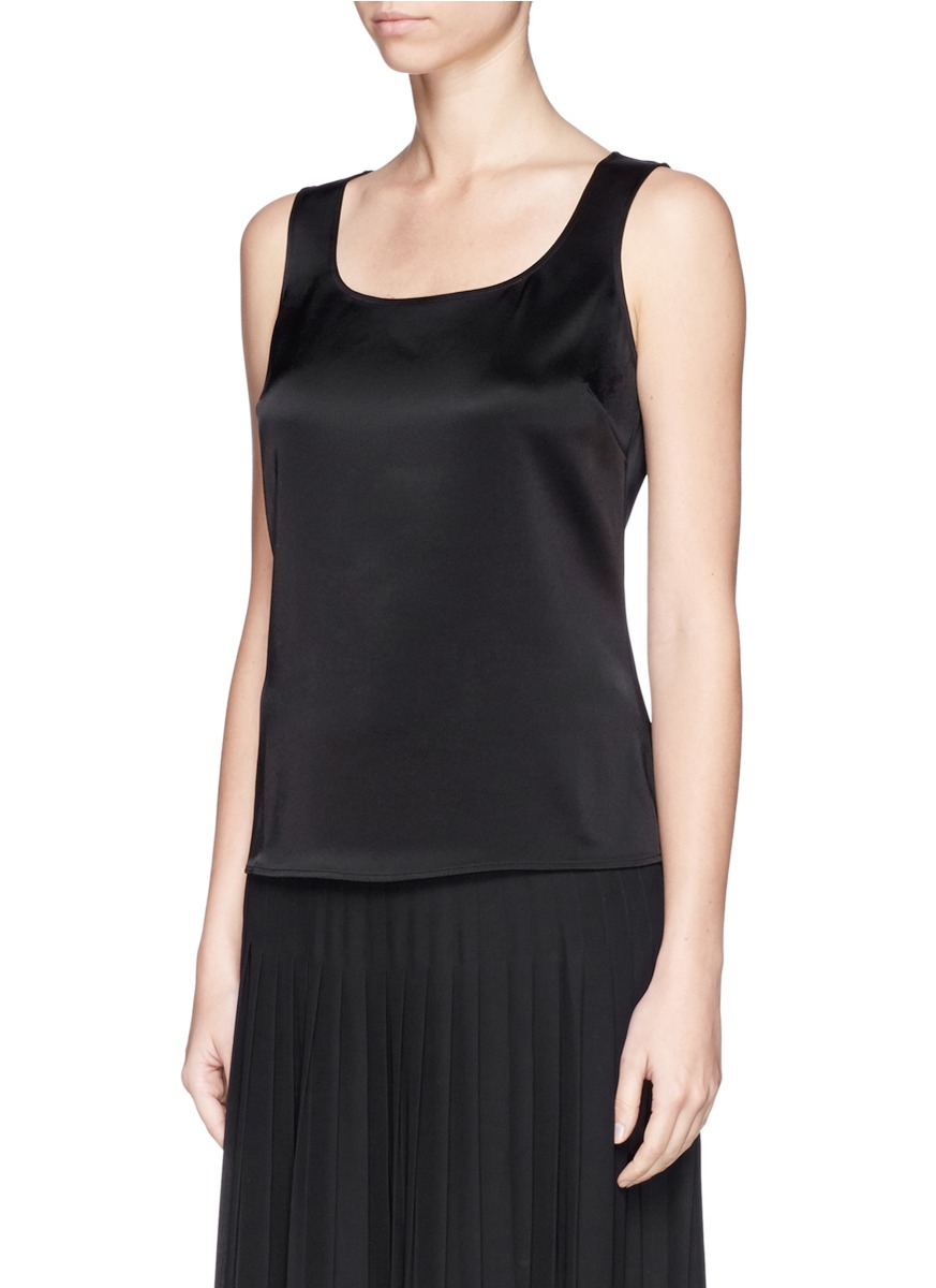 Black satin tank top This black satin tank top has a V neckline and embroidered cosmic details. Add to Wishlist. Ships within 24 hours! Low Inventory. Only # Left! This item is in stock Cosmic Love Tank Top cuz you’re the only star we see! This black satin tank top has a V neckline and embroidered cosmic details. Product Details.