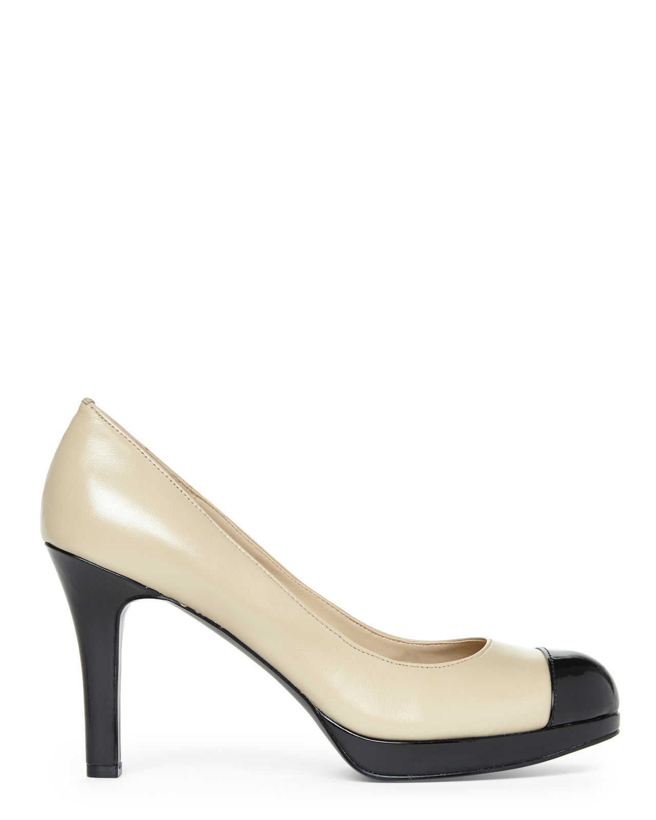 cream and black pumps