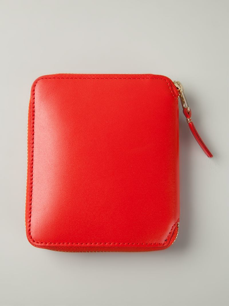 comme des garcons wallet orange