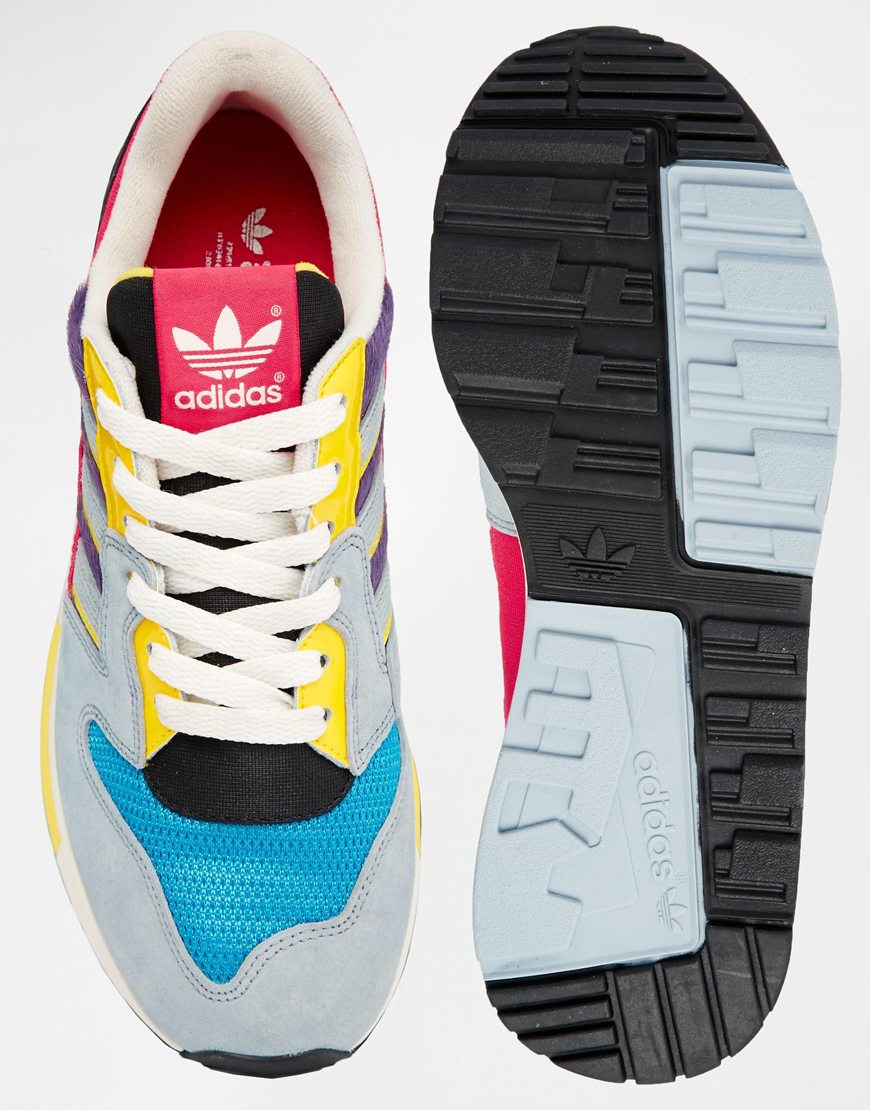 multi coloured adidas trainers